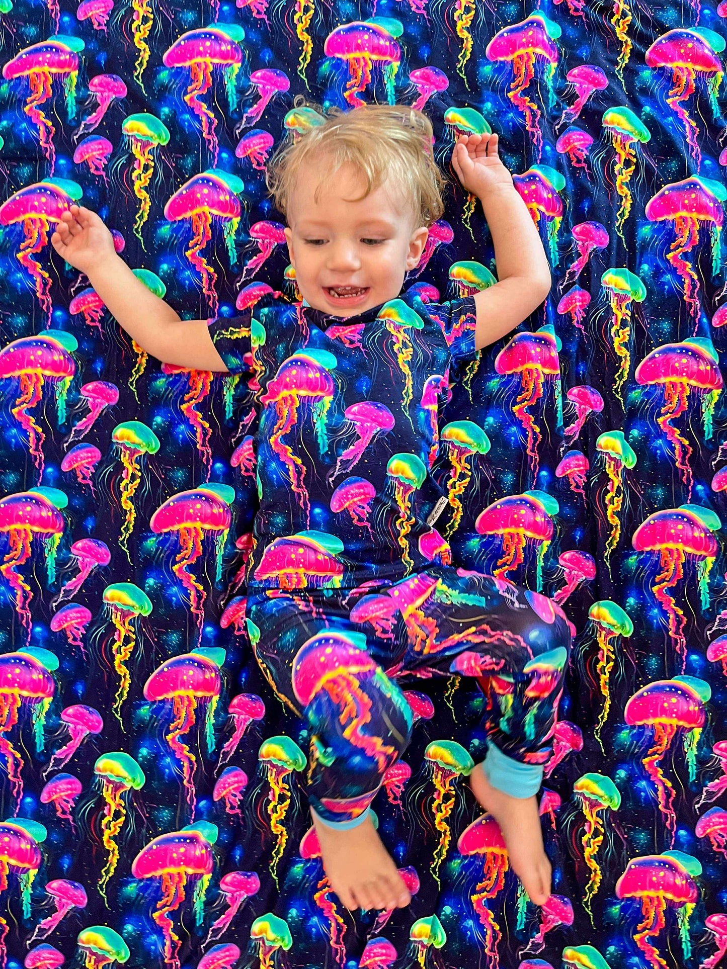 Jellyfish Glow Quilted Blanket