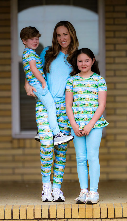 “Risen Above” Woman’s Blue Shirt