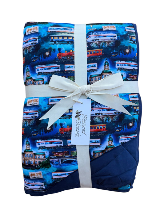 “Traveling Treasures” Quilted Blanket