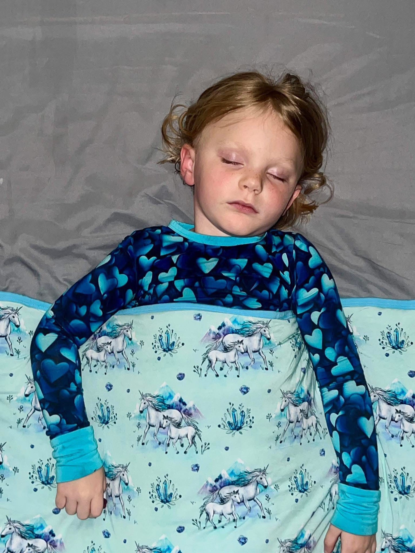 “Unicorns Dreamstone” Quilted Blanket