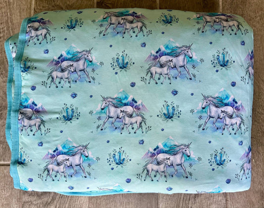 “Unicorns Dreamstone” Quilted Blanket