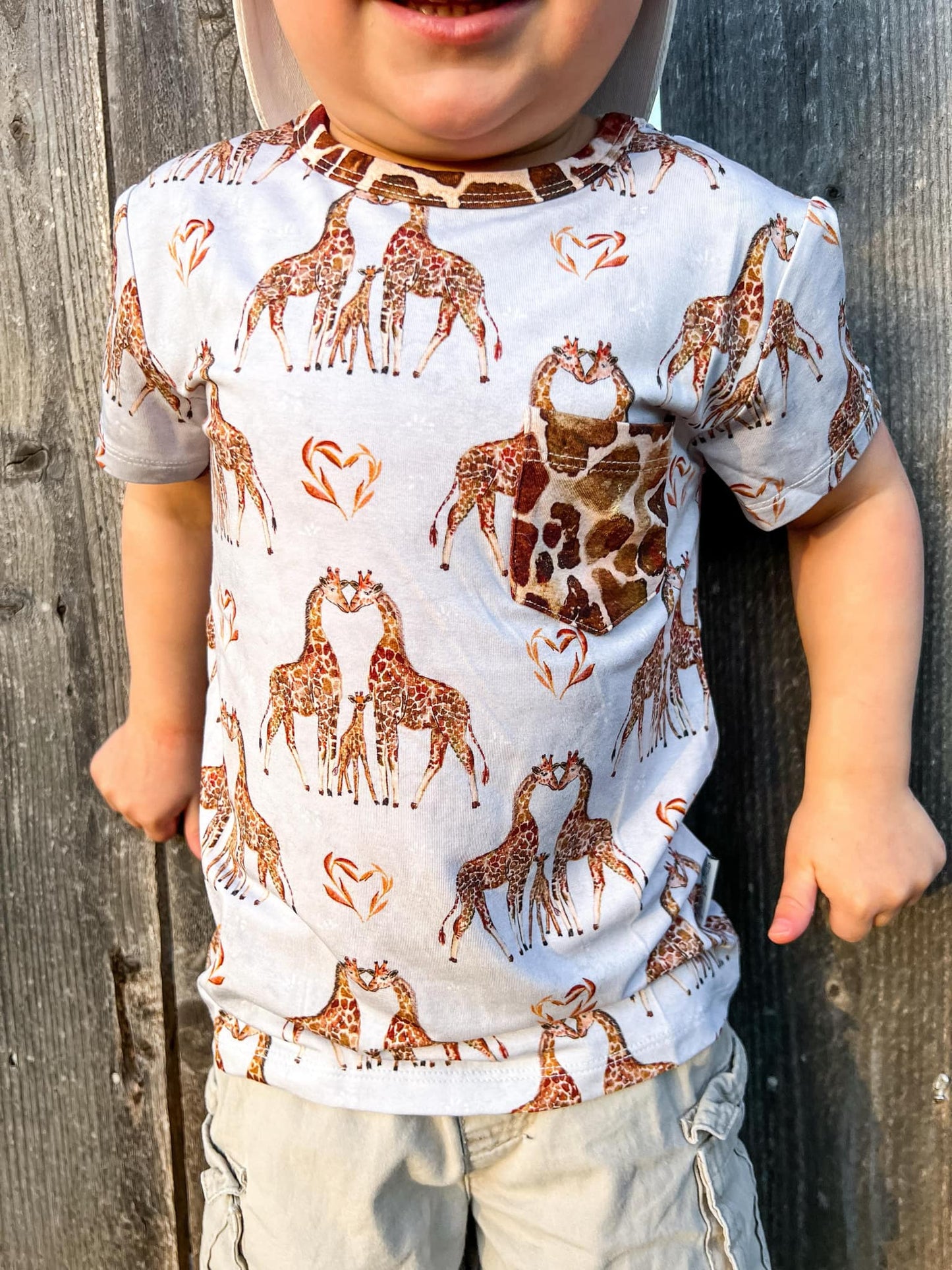 “You Bet Giraffe I’m Cute” Pocket T-Shirt