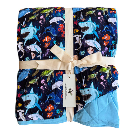 “Beyond The Reef” Quilted Blanket