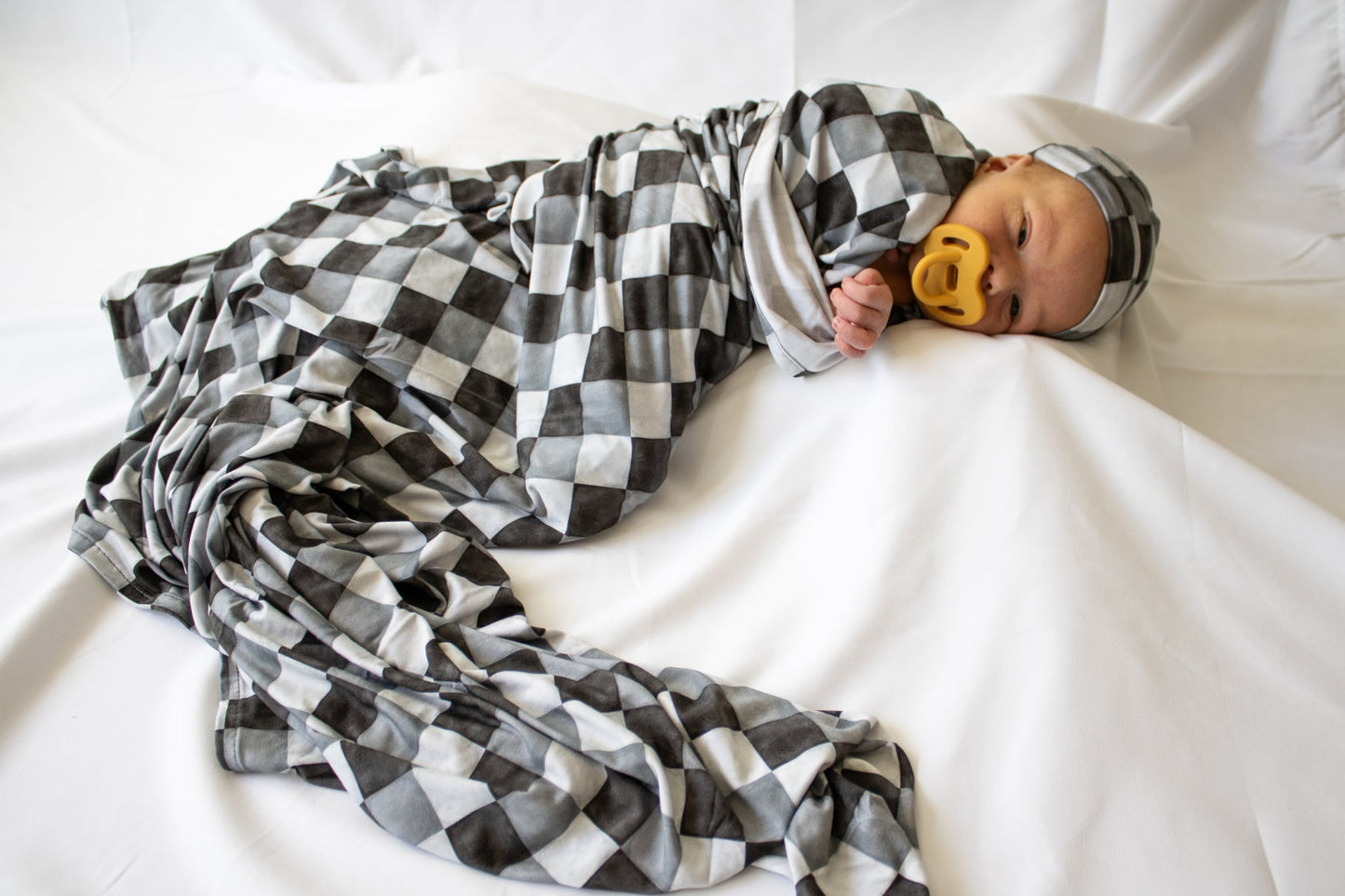 “Checkmate” Swaddle with knotted hat