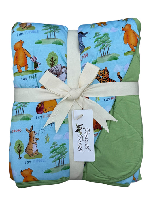 Pooh’s Path of Positivity Quilted Blanket